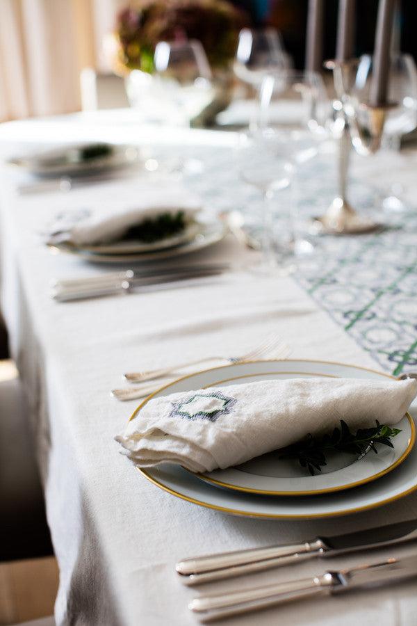 craftsmanship hand-embroidered tablecloth linen by refugees in jordan