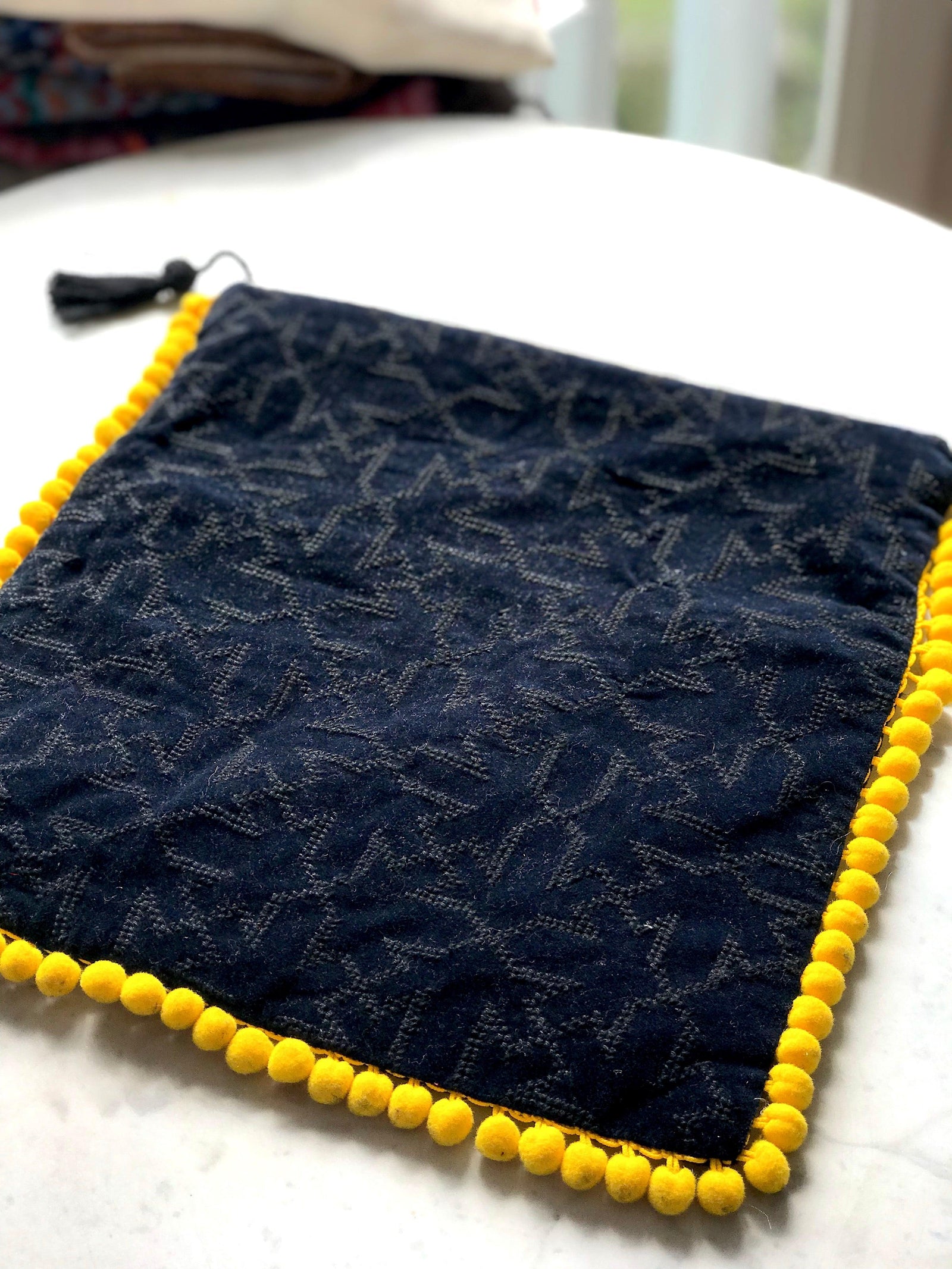 Black on Black/Yellow Pompons
